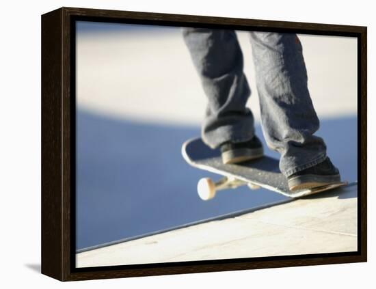 Feet on a Skateboard at the Edge of a Ramp-null-Framed Premier Image Canvas