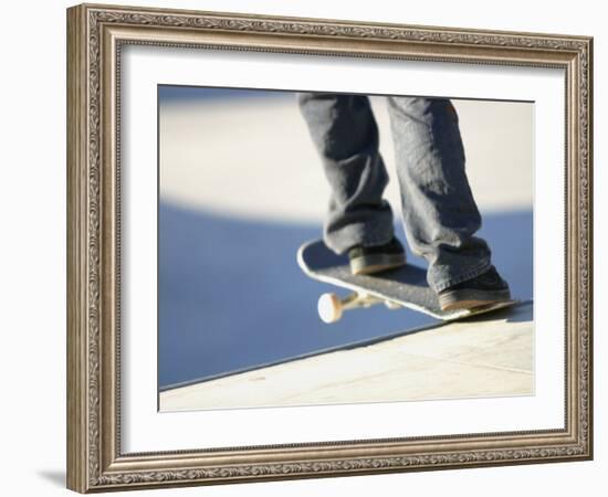 Feet on a Skateboard at the Edge of a Ramp-null-Framed Photographic Print