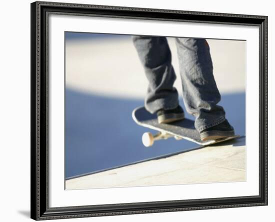 Feet on a Skateboard at the Edge of a Ramp-null-Framed Photographic Print