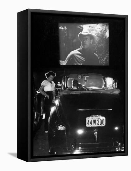 Female Car-Hop Taking Order from Couple in Convertible Car During Movie at Rancho Drive in Theater-Allan Grant-Framed Premier Image Canvas