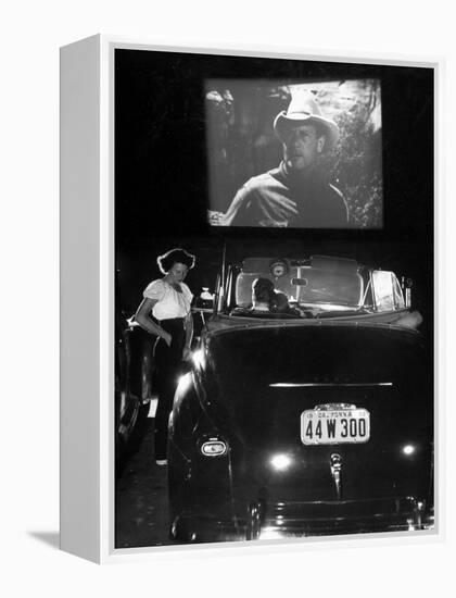 Female Car-Hop Taking Order from Couple in Convertible Car During Movie at Rancho Drive in Theater-Allan Grant-Framed Premier Image Canvas