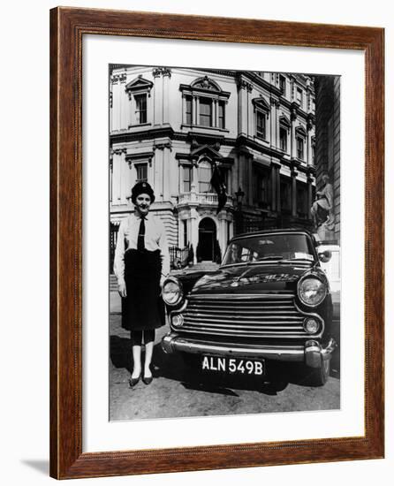 Female Chauffeur Standing by a 1964 Morris Oxford, 1964-null-Framed Photographic Print