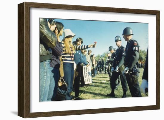 Female Demonstrator Offers a Flower to Military Police During the 1967 March on the Pentagon-null-Framed Premium Photographic Print