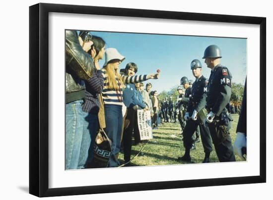 Female Demonstrator Offers a Flower to Military Police During the 1967 March on the Pentagon-null-Framed Premium Photographic Print