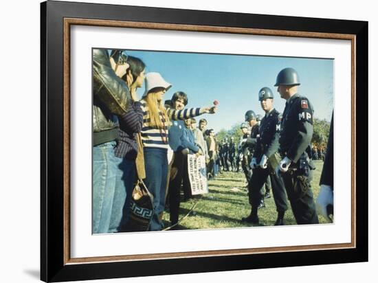 Female Demonstrator Offers a Flower to Military Police During the 1967 March on the Pentagon-null-Framed Premium Photographic Print