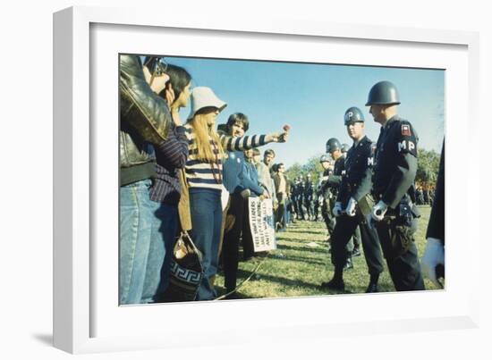 Female Demonstrator Offers a Flower to Military Police During the 1967 March on the Pentagon-null-Framed Premium Photographic Print