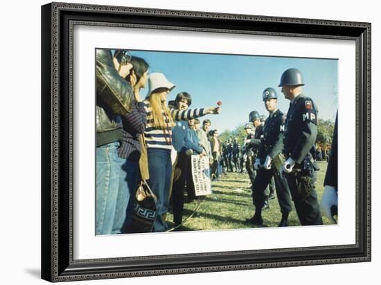 Female Demonstrator Offers a Flower to Military Police During the 1967 March on the Pentagon-null-Framed Premium Photographic Print