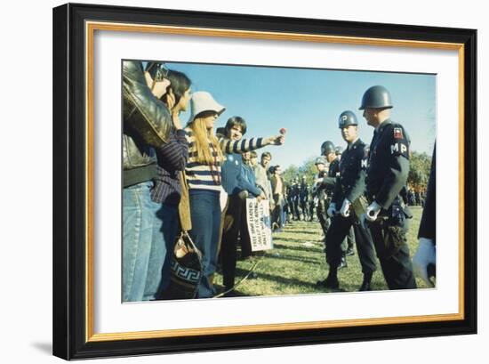 Female Demonstrator Offers a Flower to Military Police During the 1967 March on the Pentagon-null-Framed Premium Photographic Print