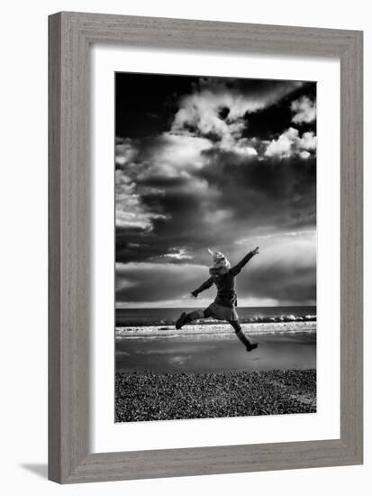 Female Figure Jumping on a Beach-Rory Garforth-Framed Photographic Print