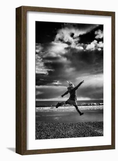 Female Figure Jumping on a Beach-Rory Garforth-Framed Photographic Print