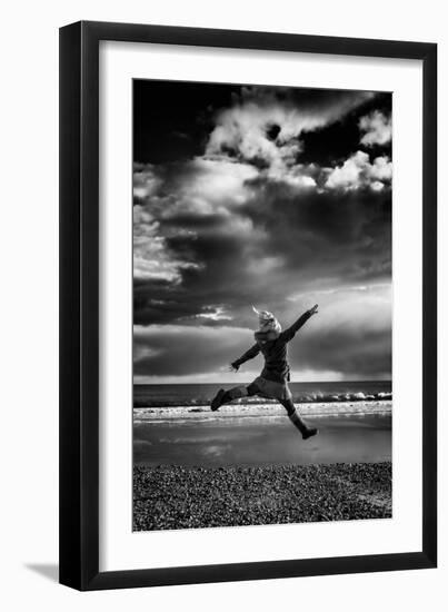 Female Figure Jumping on a Beach-Rory Garforth-Framed Photographic Print