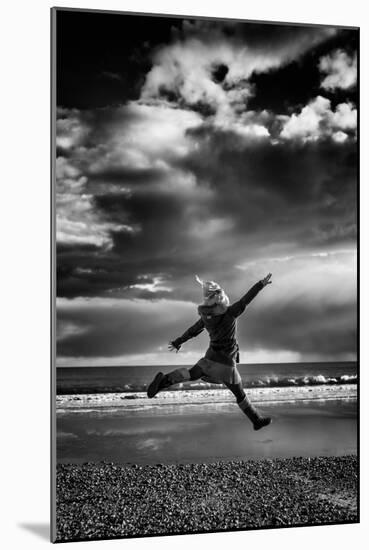 Female Figure Jumping on a Beach-Rory Garforth-Mounted Photographic Print