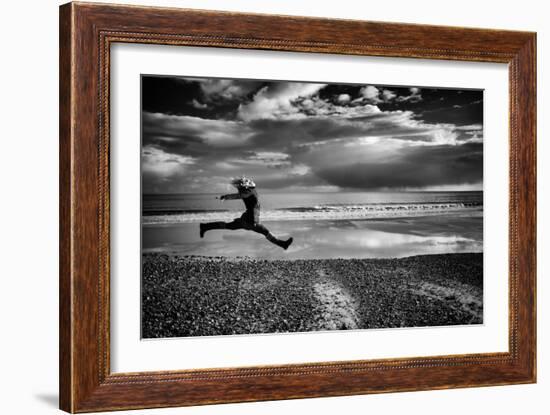 Female Figure Jumping on a Beach-Rory Garforth-Framed Photographic Print