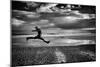 Female Figure Jumping on a Beach-Rory Garforth-Mounted Photographic Print