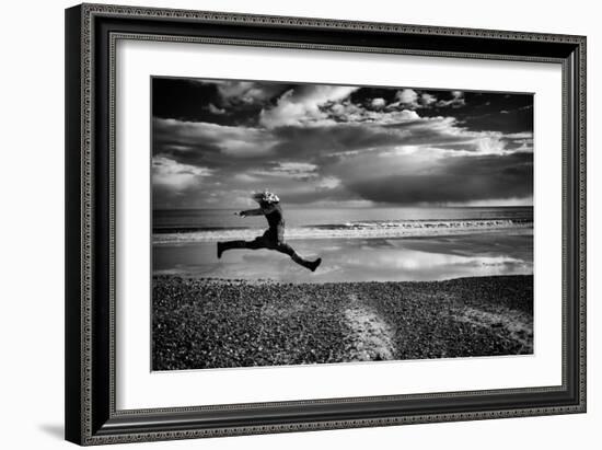 Female Figure Jumping on a Beach-Rory Garforth-Framed Photographic Print