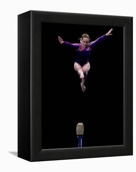 Female Gymnast Performing on the Balance Beam-null-Framed Premier Image Canvas