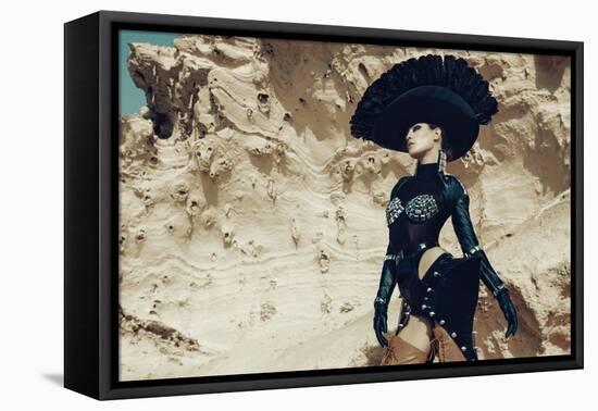 Female Model Wearing Black with Feathers-Luis Beltran-Framed Premier Image Canvas