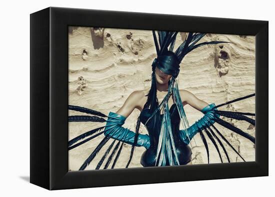 Female Model Wearing Feathers-Luis Beltran-Framed Premier Image Canvas