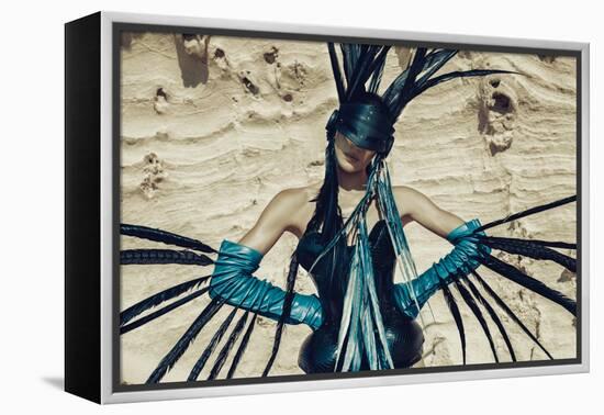Female Model Wearing Feathers-Luis Beltran-Framed Premier Image Canvas