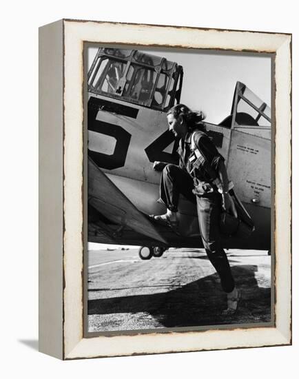 Female Pilot of the Us Women's Air Force Service Posed with Her Leg Up on the Wing of an Airplane-Peter Stackpole-Framed Premier Image Canvas