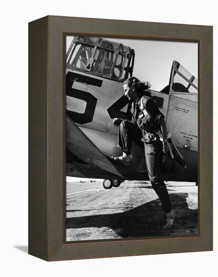 Female Pilot of the Us Women's Air Force Service Posed with Her Leg Up on the Wing of an Airplane-Peter Stackpole-Framed Premier Image Canvas