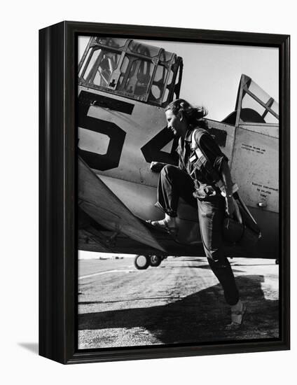 Female Pilot of the Us Women's Air Force Service Posed with Her Leg Up on the Wing of an Airplane-Peter Stackpole-Framed Premier Image Canvas