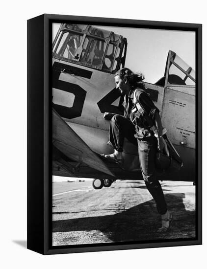 Female Pilot of the Us Women's Air Force Service Posed with Her Leg Up on the Wing of an Airplane-Peter Stackpole-Framed Premier Image Canvas