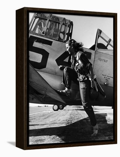 Female Pilot of the Us Women's Air Force Service Posed with Her Leg Up on the Wing of an Airplane-Peter Stackpole-Framed Premier Image Canvas