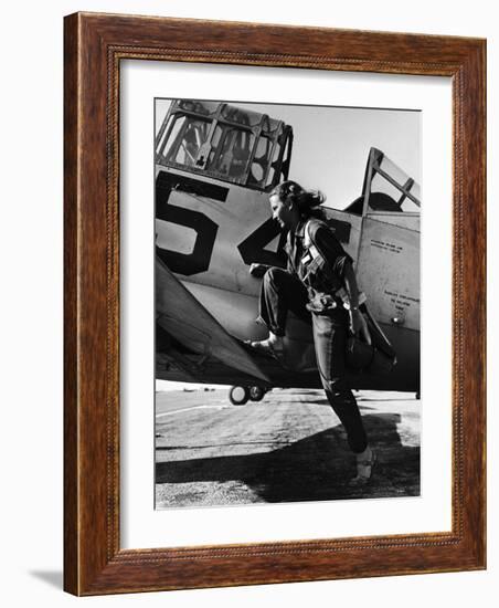 Female Pilot of the Us Women's Air Force Service Posed with Her Leg Up on the Wing of an Airplane-Peter Stackpole-Framed Photographic Print