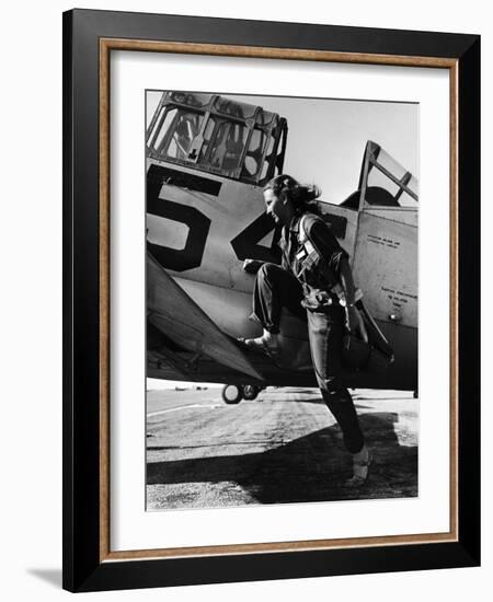 Female Pilot of the Us Women's Air Force Service Posed with Her Leg Up on the Wing of an Airplane-Peter Stackpole-Framed Photographic Print