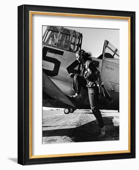 Female Pilot of the Us Women's Air Force Service Posed with Her Leg Up on the Wing of an Airplane-Peter Stackpole-Framed Photographic Print