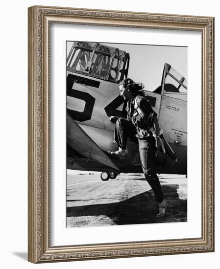 Female Pilot of the Us Women's Air Force Service Posed with Her Leg Up on the Wing of an Airplane-Peter Stackpole-Framed Premium Photographic Print