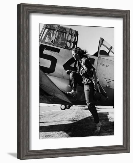 Female Pilot of the Us Women's Air Force Service Posed with Her Leg Up on the Wing of an Airplane-Peter Stackpole-Framed Premium Photographic Print