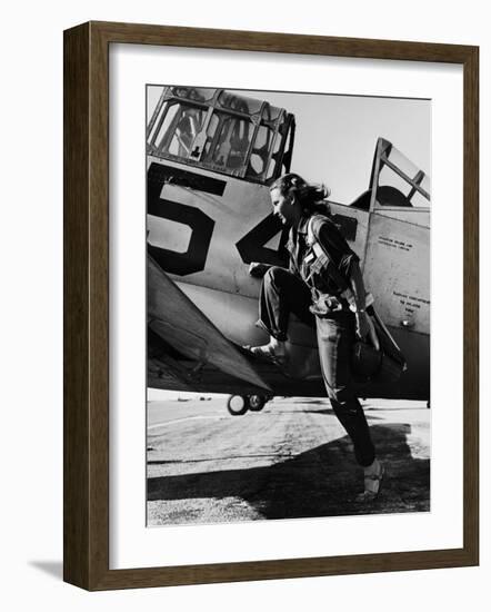 Female Pilot of the Us Women's Air Force Service Posed with Her Leg Up on the Wing of an Airplane-Peter Stackpole-Framed Premium Photographic Print