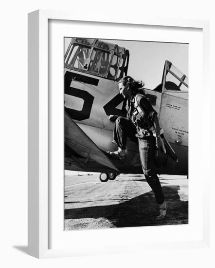 Female Pilot of the Us Women's Air Force Service Posed with Her Leg Up on the Wing of an Airplane-Peter Stackpole-Framed Premium Photographic Print