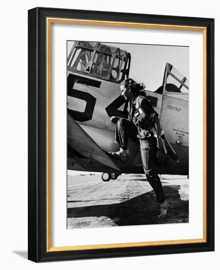 Female Pilot of the Us Women's Air Force Service Posed with Her Leg Up on the Wing of an Airplane-Peter Stackpole-Framed Premium Photographic Print