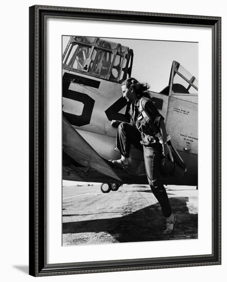 Female Pilot of the Us Women's Air Force Service Posed with Her Leg Up on the Wing of an Airplane-Peter Stackpole-Framed Premium Photographic Print