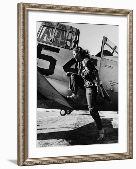 Female Pilot of the Us Women's Air Force Service Posed with Her Leg Up on the Wing of an Airplane-Peter Stackpole-Framed Premium Photographic Print