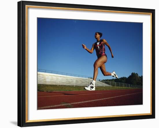 Female Runner Training on the Track-null-Framed Photographic Print