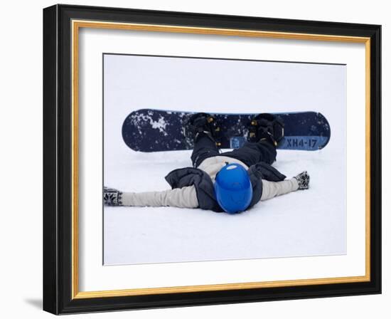 Female Snowboarder Collapsed after a Run, New York, USA-Paul Sutton-Framed Photographic Print