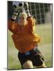 Female Soccer Goalie Catching the Ball-null-Mounted Photographic Print