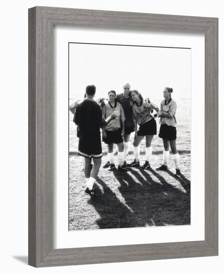 Female Soccer Team Standing in Front of Their Couch-null-Framed Photographic Print