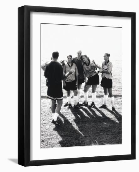 Female Soccer Team Standing in Front of Their Couch-null-Framed Photographic Print