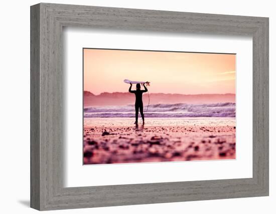 Female Surfer on the Beach at the Sunset-iko-Framed Photographic Print