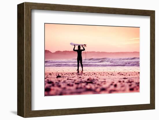 Female Surfer on the Beach at the Sunset-iko-Framed Photographic Print
