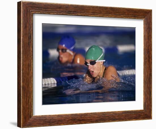 Female Swimmers Competing in a Breaststroke Race-null-Framed Photographic Print