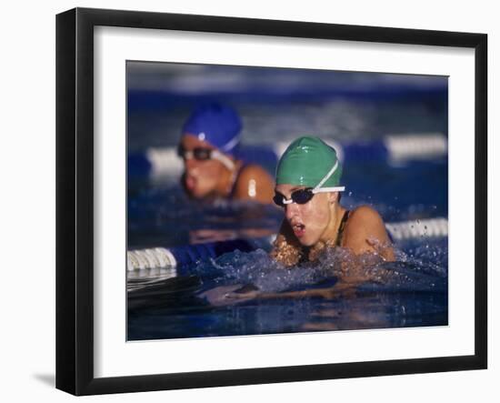 Female Swimmers Competing in a Breaststroke Race-null-Framed Photographic Print