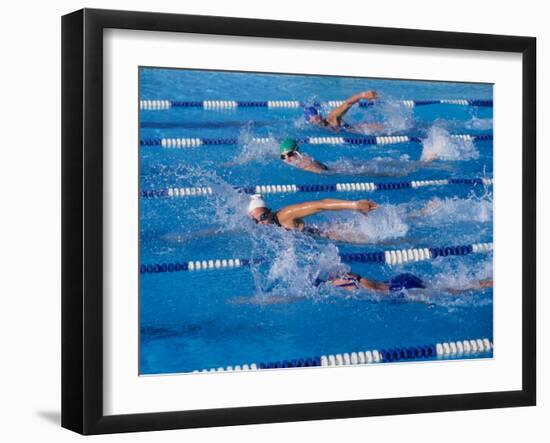 Female Swimmers Competing in a Freestyle Race-null-Framed Photographic Print