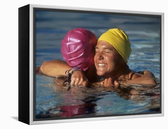 Female Swimmers Reacts to Victory-null-Framed Premier Image Canvas