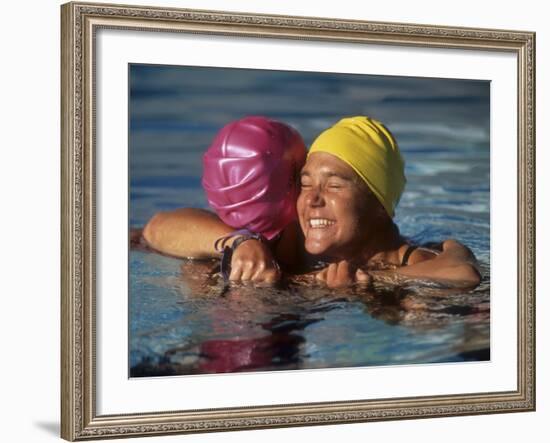 Female Swimmers Reacts to Victory-null-Framed Photographic Print